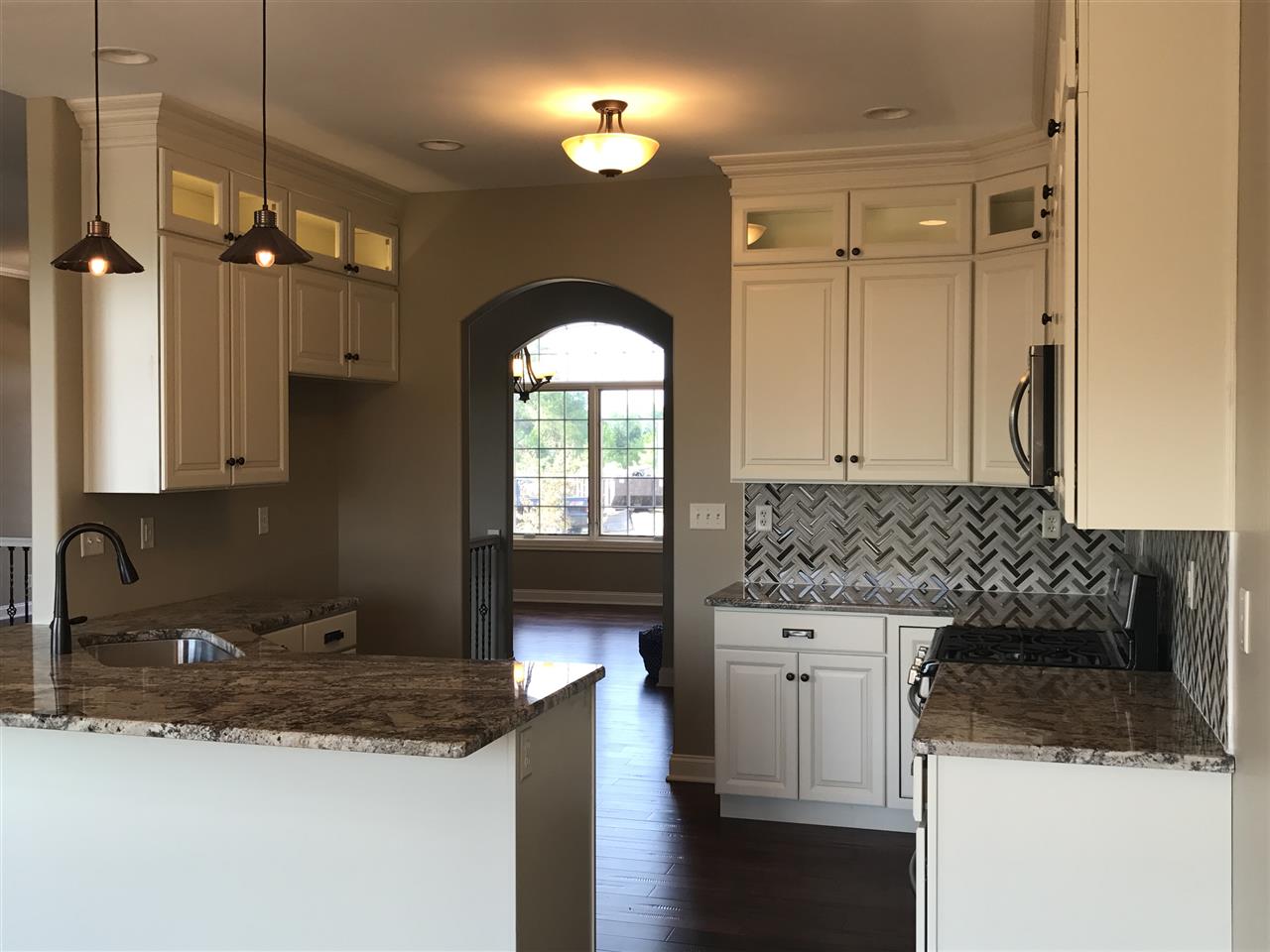 2840 Hamson Way Belvidere, IL 61008 - Photo 5 of 24 a kitchen with a sink and cabinets