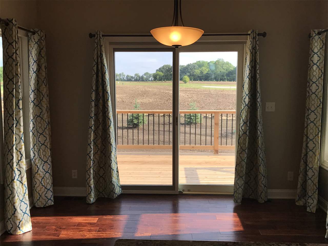 2840 Hamson Way Belvidere, IL 61008 - Photo 7 of 24 a view of room with window and wooden floor