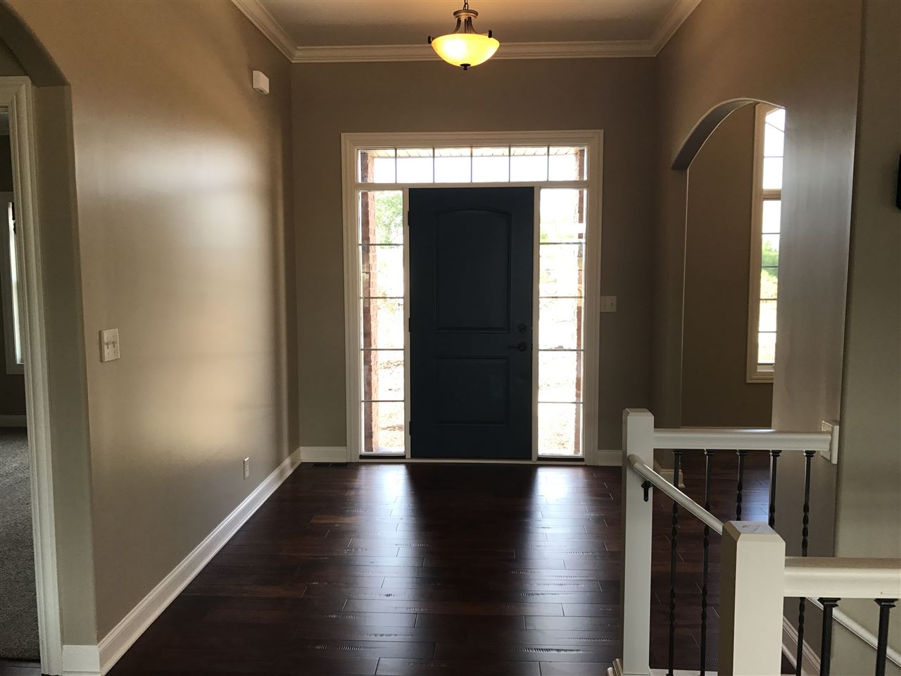 2840 Hamson Way Belvidere, IL 61008 - Photo 10 of 24 an empty room with wooden floor and windows
