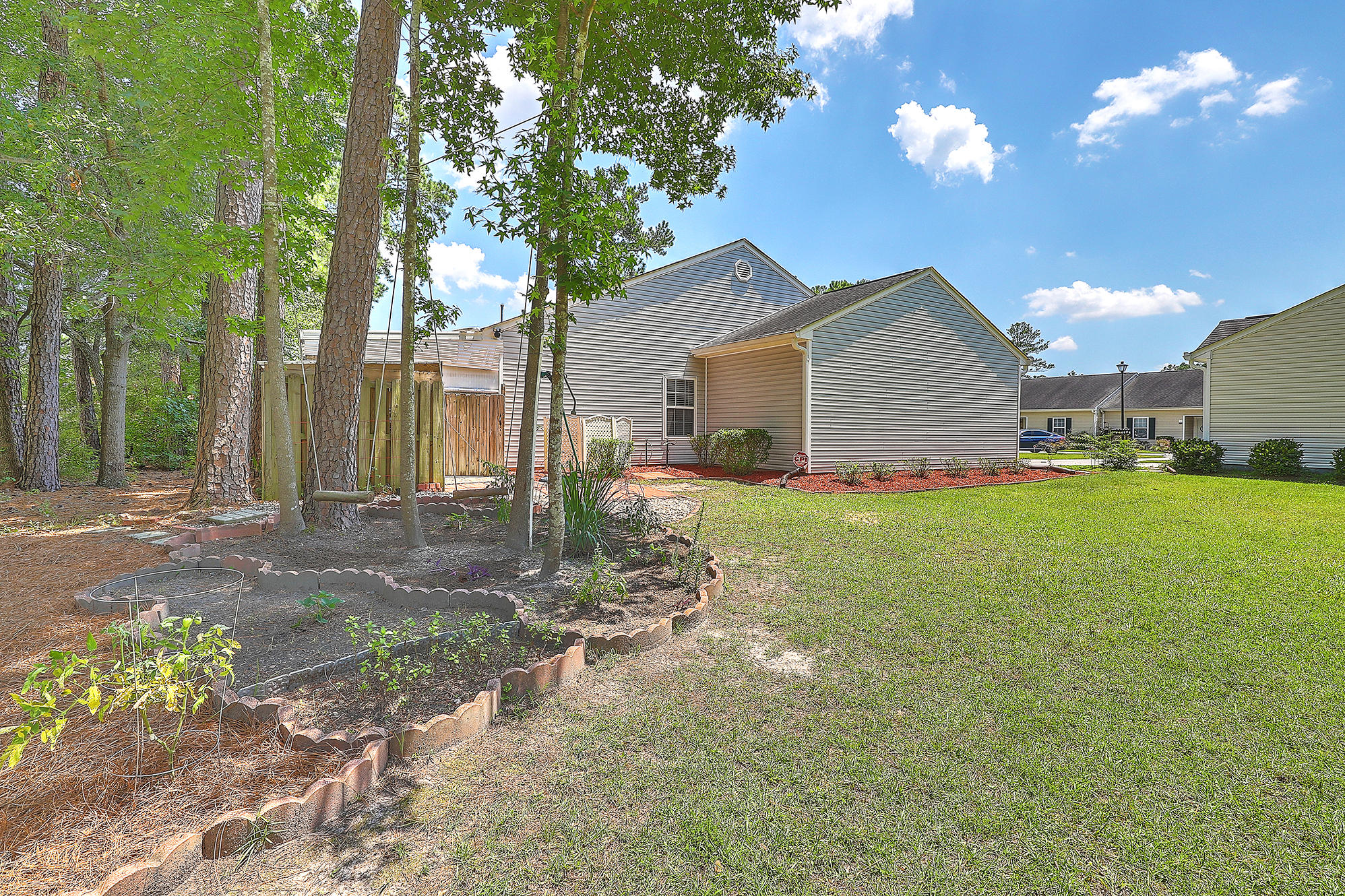 100 Bridgetown Road, Unit 1B Goose Creek, SC 29445 - Photo 29 of 44 100Bridgetown1BSideGarden2