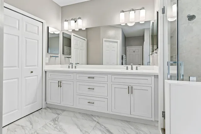 a view of washer and dryer with kitchen countertops