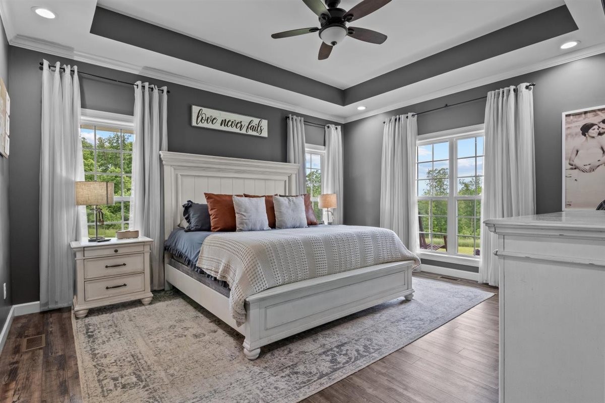 3571 Old Blacktop Road McEwen, TN 37101 - Photo 27 of 99 a bed sitting in a spacious bedroom next to a window