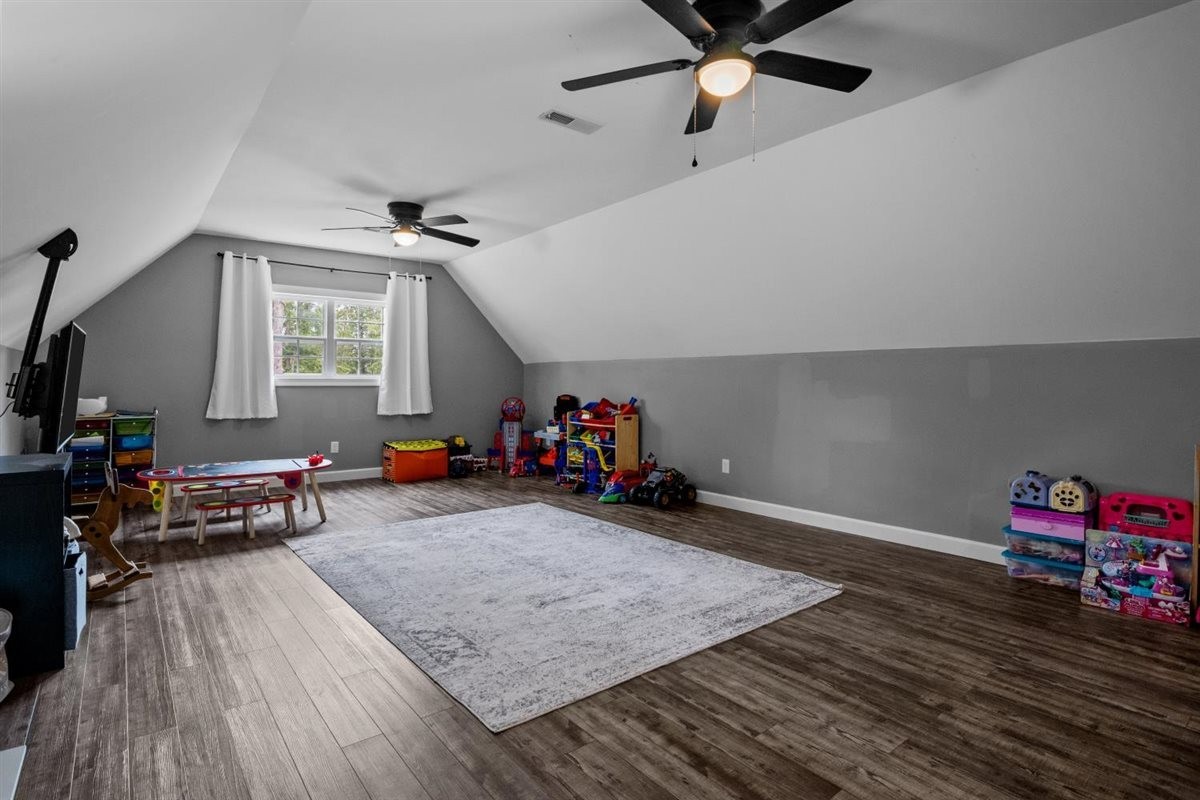 3571 Old Blacktop Road McEwen, TN 37101 - Photo 40 of 99 a view of a livingroom with furniture and a ceiling fan