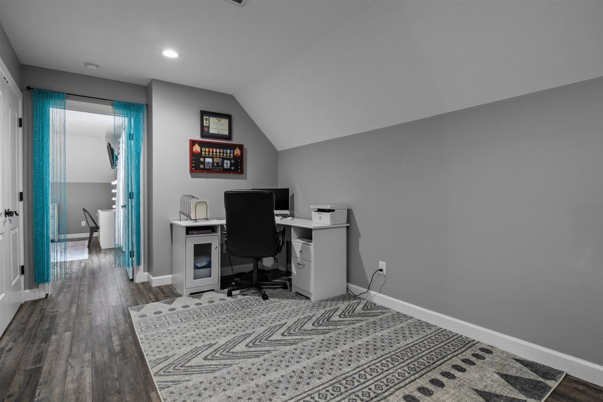 3571 Old Blacktop Road McEwen, TN 37101 - Photo 42 of 99 a view of a workspace with furniture and wooden floor