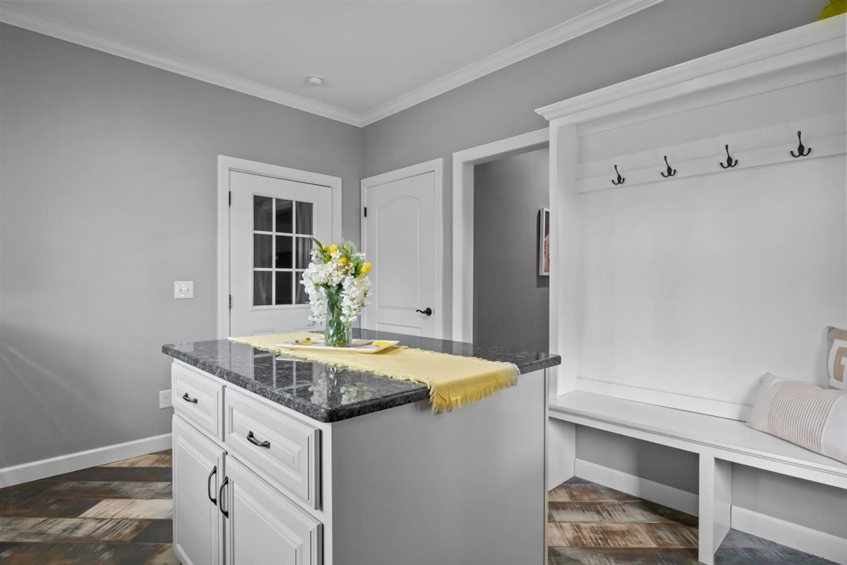 3571 Old Blacktop Road McEwen, TN 37101 - Photo 47 of 99 a kitchen with stainless steel appliances granite countertop a sink stove and refrigerator