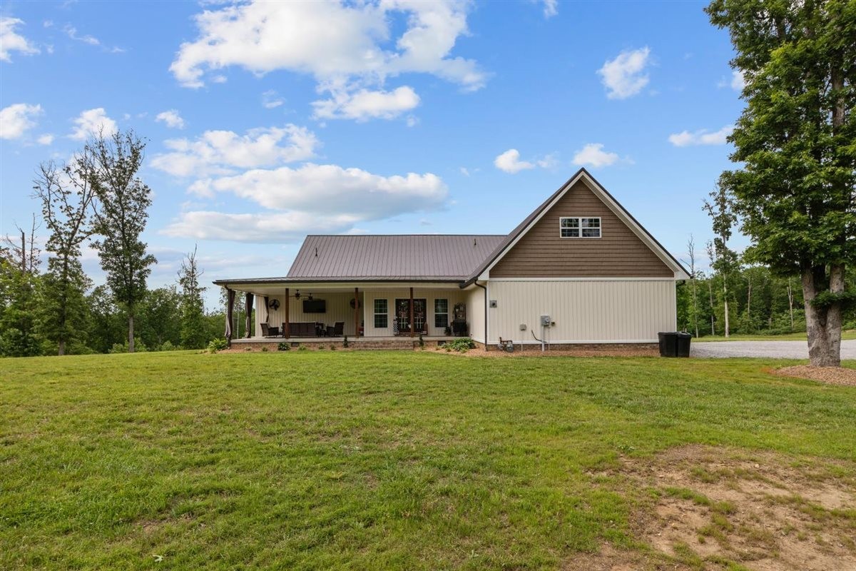 3571 Old Blacktop Road McEwen, TN 37101 - Photo 64 of 99 a front view of a house with a yard