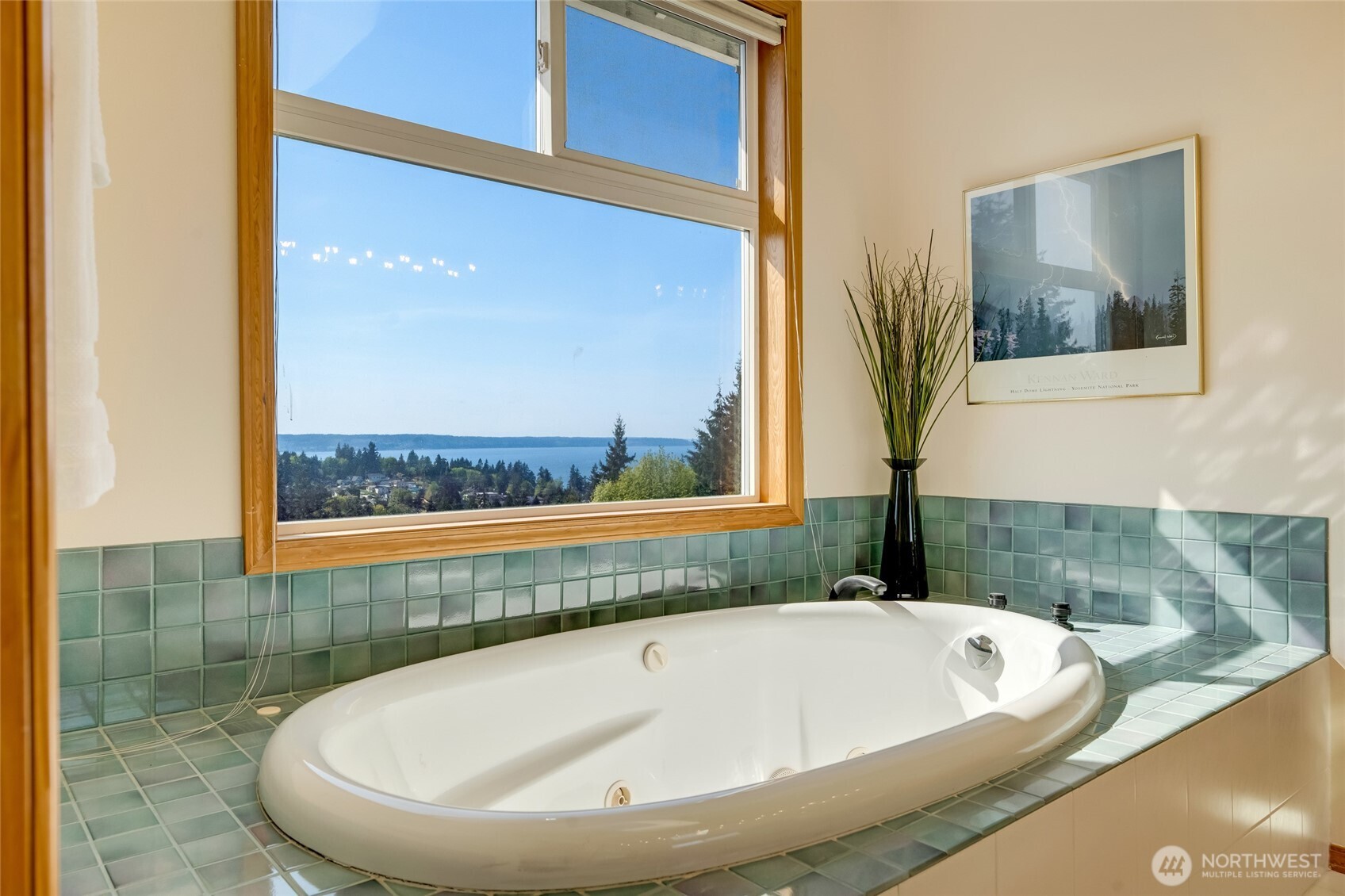 4920 Seahurst Avenue Everett, WA 98203 - Photo 27 of 39 a bath tub sitting in a bathroom next to a window
