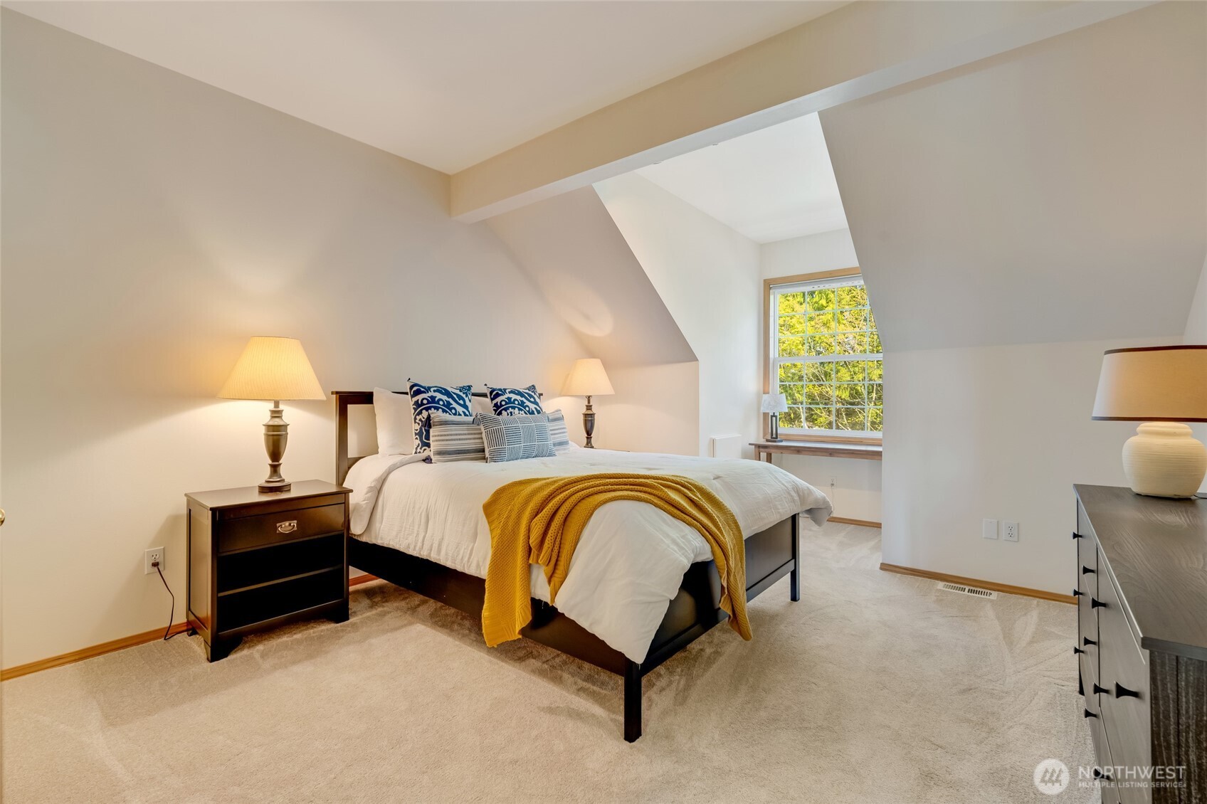 4920 Seahurst Avenue Everett, WA 98203 - Photo 30 of 39 a spacious bedroom with a bed and a window