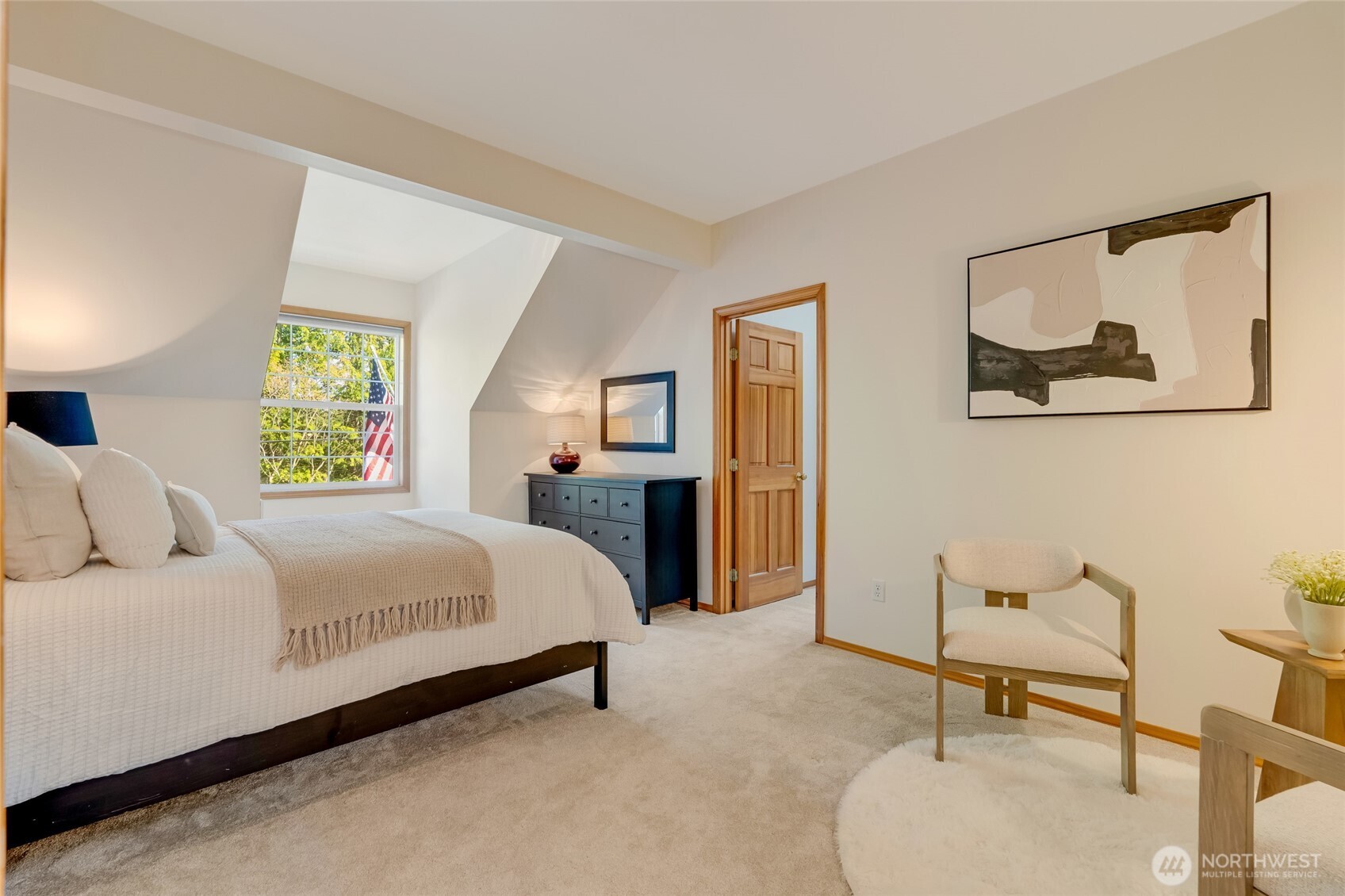 4920 Seahurst Avenue Everett, WA 98203 - Photo 32 of 39 a bedroom with a bed and a painting on the wall