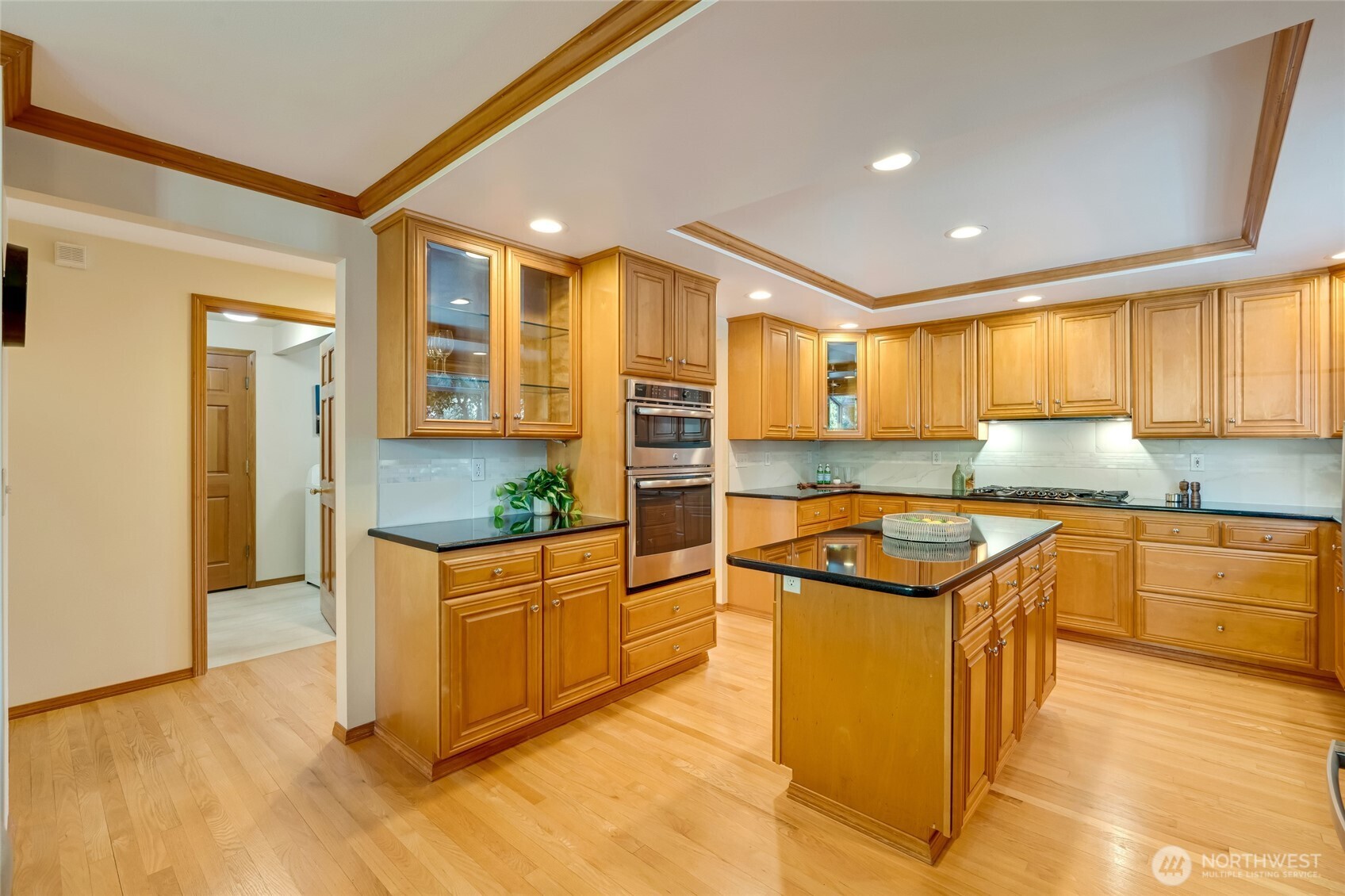 4920 Seahurst Avenue Everett, WA 98203 - Photo 9 of 39 a kitchen with stainless steel appliances granite countertop a stove a sink and a refrigerator
