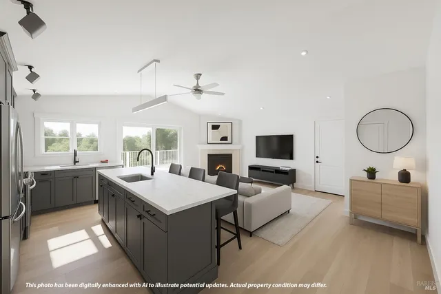 a kitchen with a dining table chairs and a refrigerator