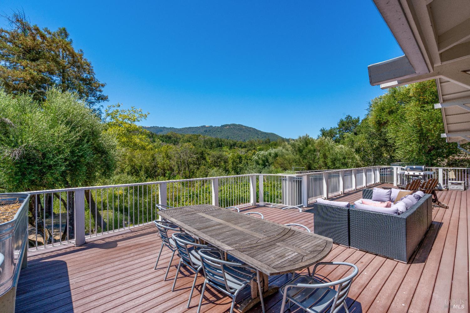 4920 Warm Springs Road Glen Ellen, CA 95442 - Photo 12 of 54 Gorgeous deck with ample room for entertaining, cooking, dining and lounging.