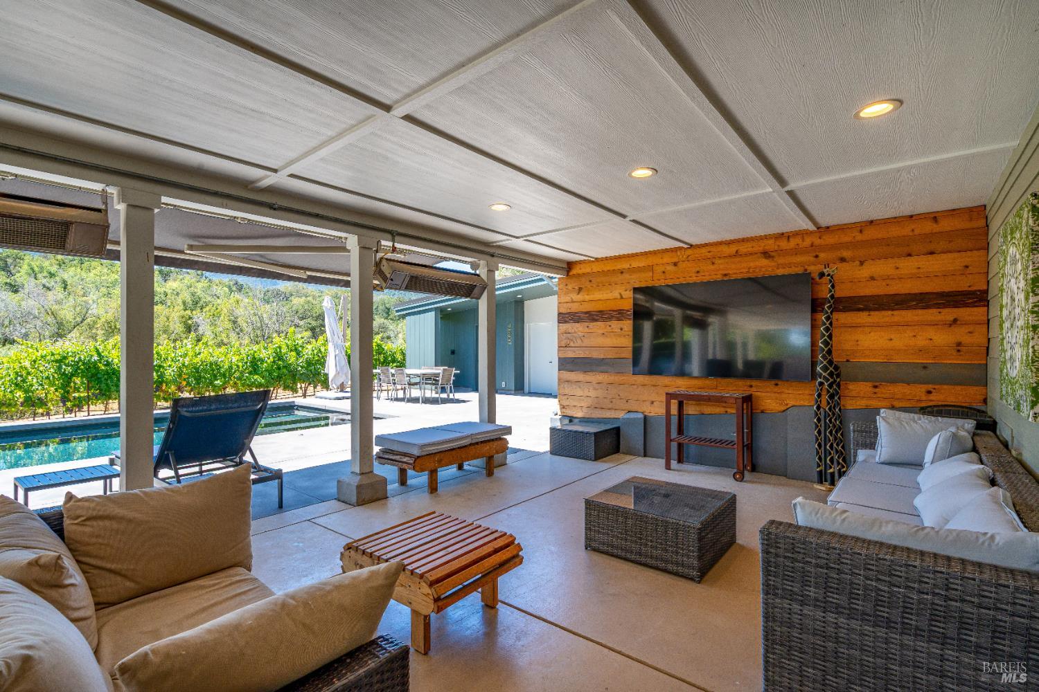 4920 Warm Springs Road Glen Ellen, CA 95442 - Photo 28 of 54 Step into the shade after a dip into the outdoor lounge with view and heaters.