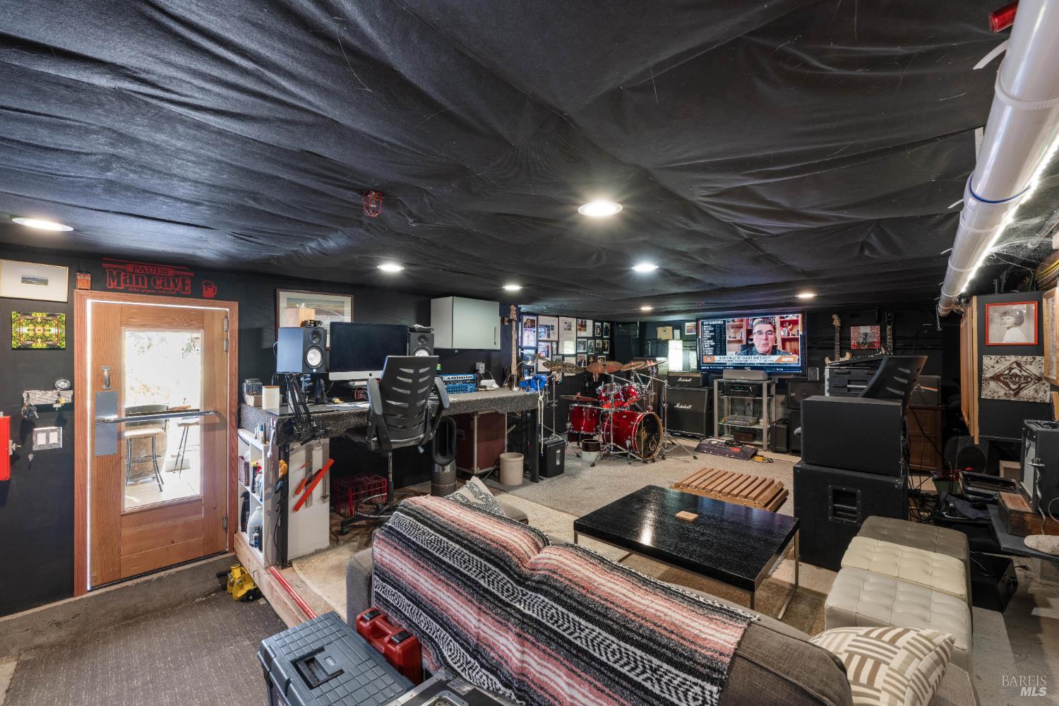 4920 Warm Springs Road Glen Ellen, CA 95442 - Photo 38 of 54 Below the main house: Finished space is soundproofed and rodent proofed - great for hobbies and storage.