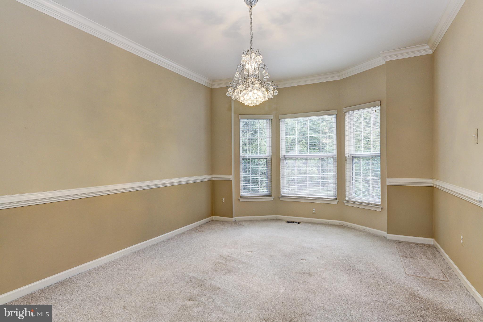 201 Marshall Wood Road Reisterstown, MD 21136 - Photo 10 of 28 Dining Room with crown and chair moldings