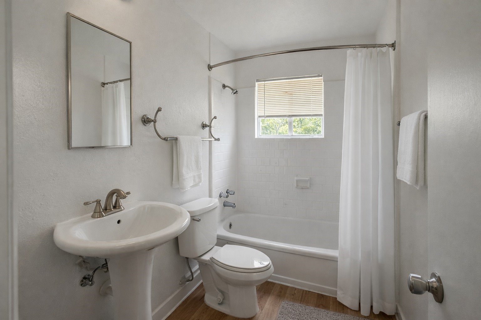 5611 Jackson Street, Unit 11 Houston, TX 77004 - Photo 3 of 7 a bathroom with a sink toilet and shower
