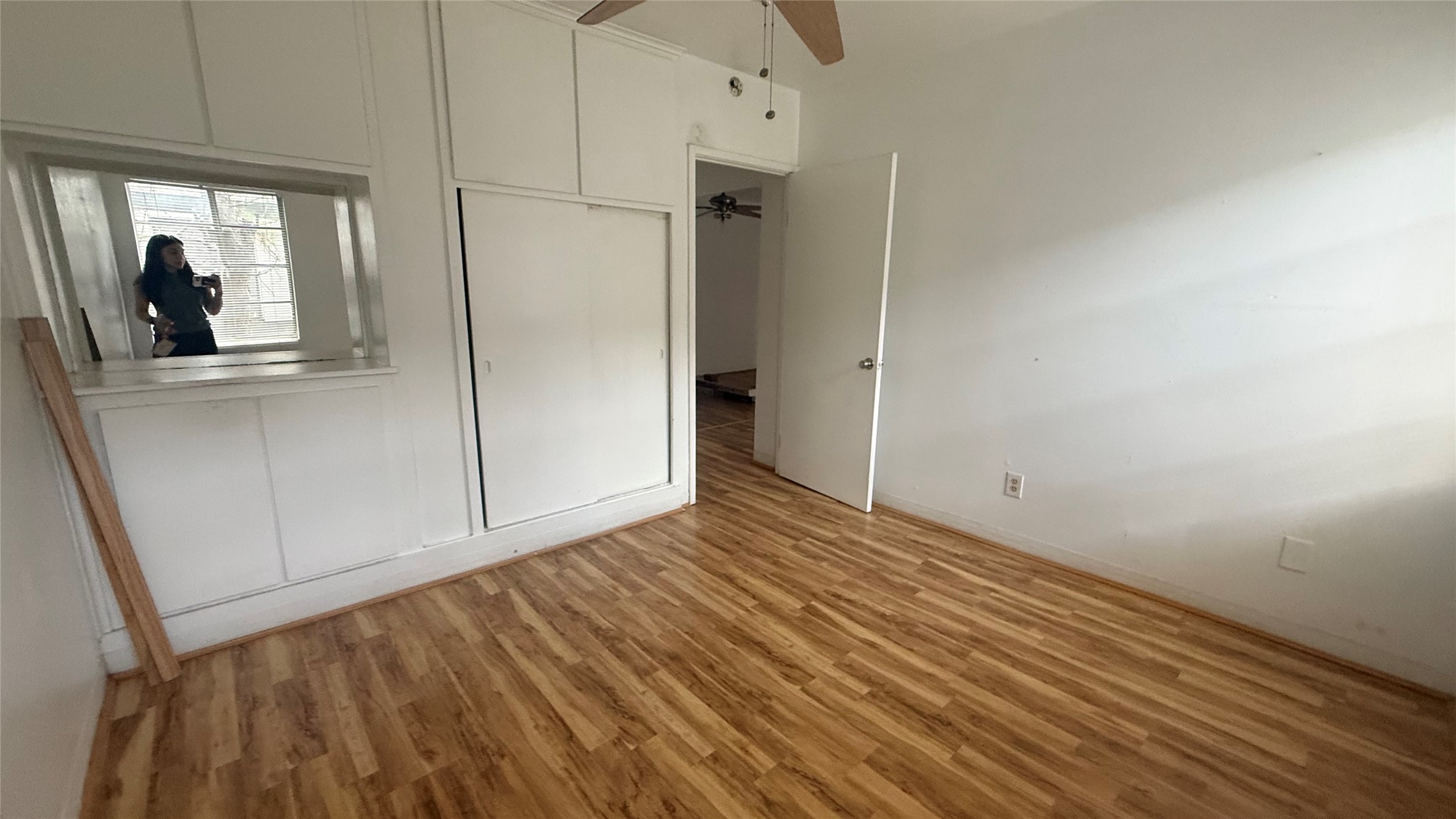 5611 Jackson Street, Unit 11 Houston, TX 77004 - Photo 7 of 7 a view of empty room with wooden floor