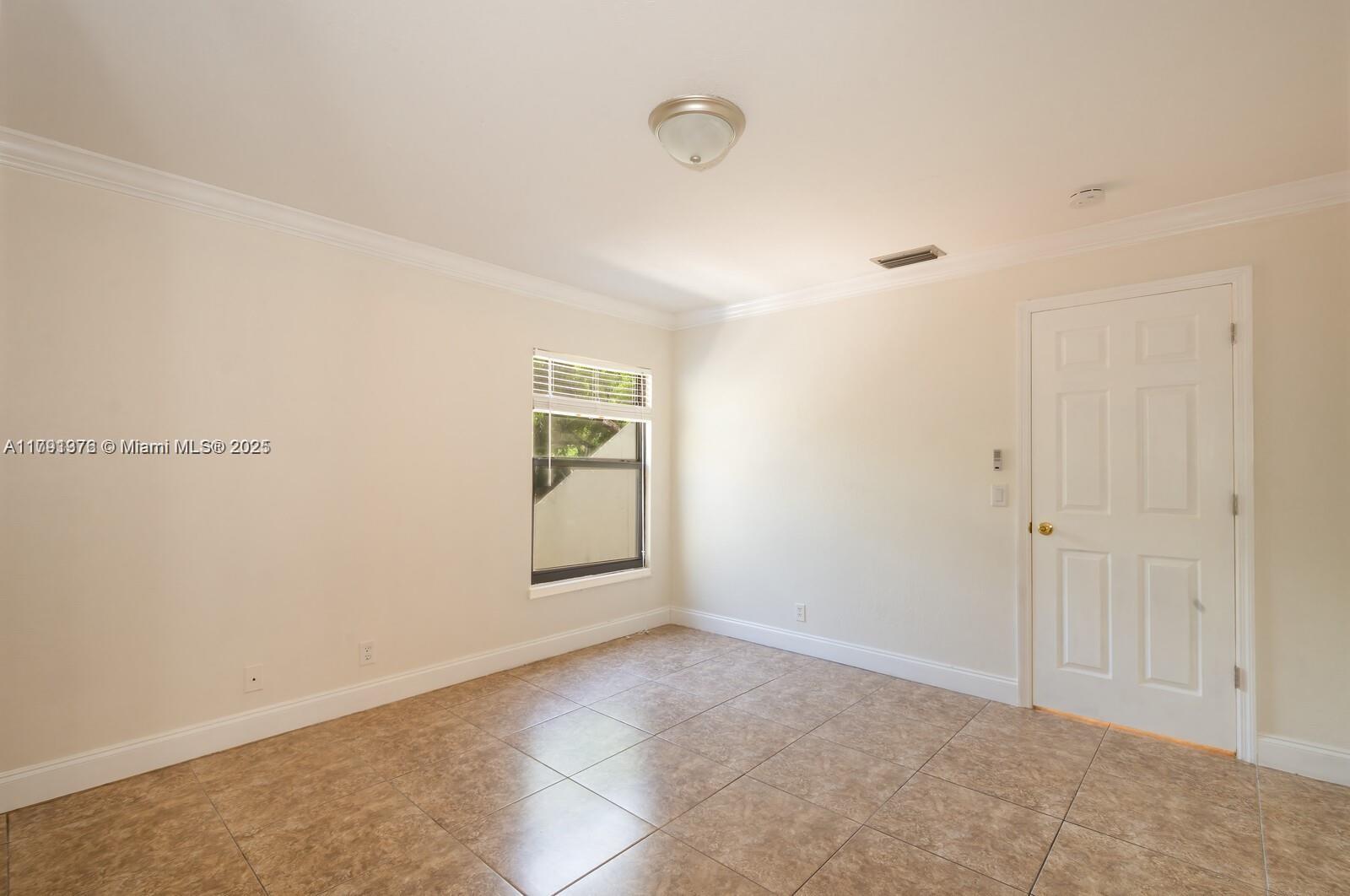1 Crossings Circle, Unit E Boynton Beach, FL 33435 - Photo 6 of 14 an empty room with windows and closet