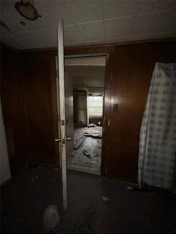 a view of a house with potted plants