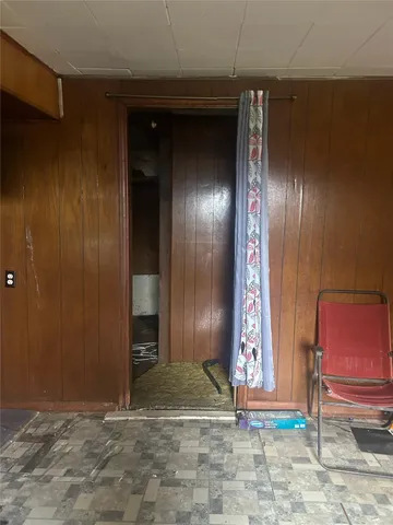 a room with furniture and flat screen tv