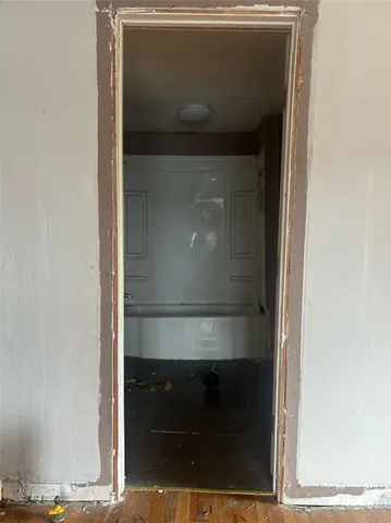 a view of a porch with furniture and a yard