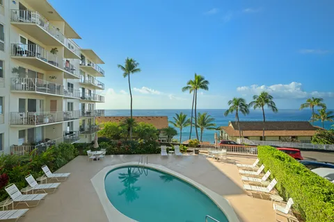 a view of a swimming pool with a patio