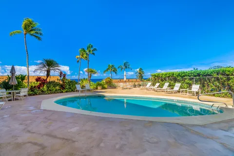 a view of a house with a swimming pool