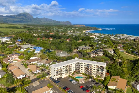 a view of a city with an ocean