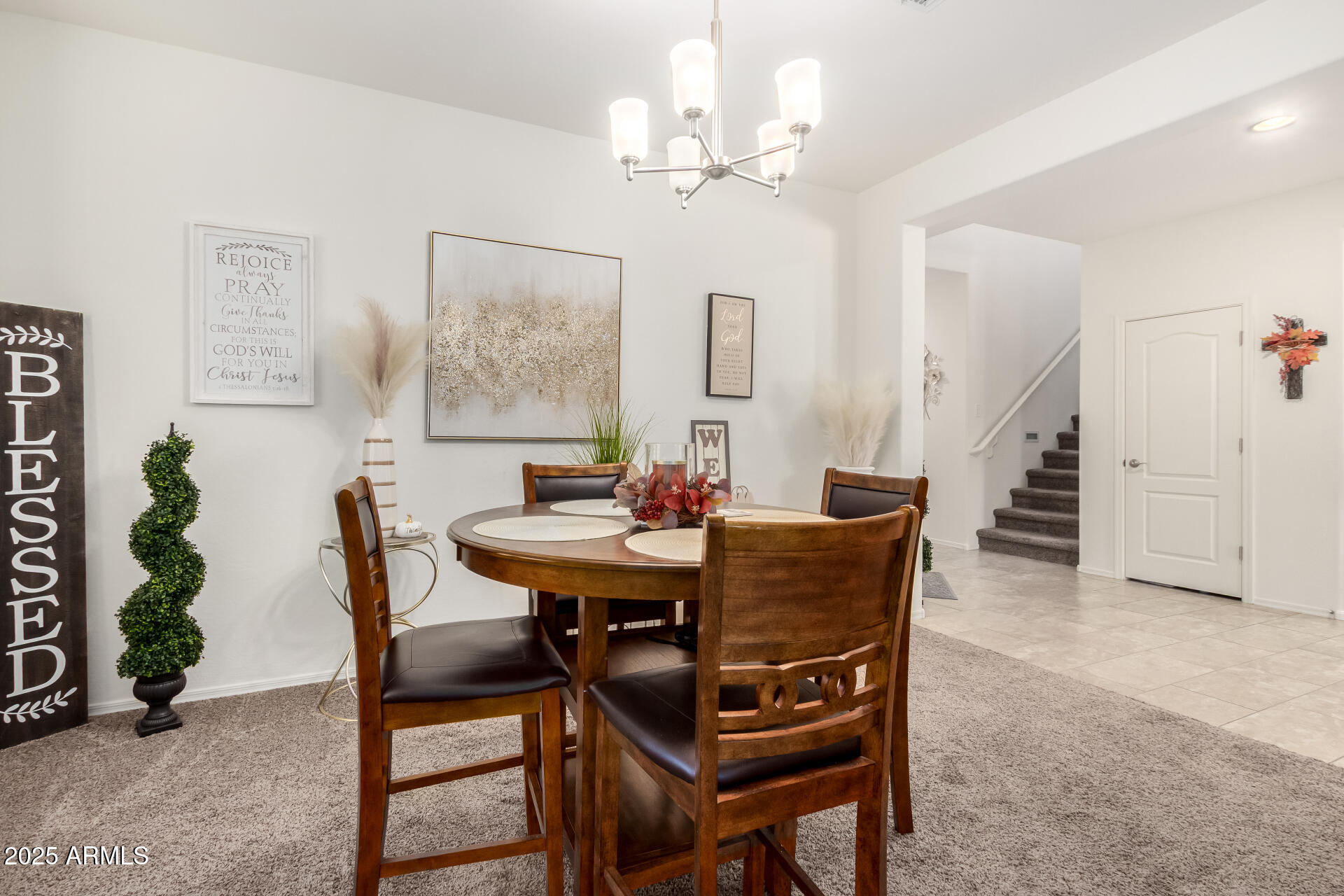 2665 East Gillcrest Road Gilbert, AZ 85298 - Photo 8 of 48 a view of a dining room with furniture and wooden floor