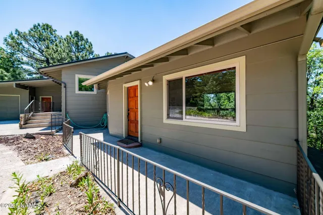 a view of a room with wooden walls