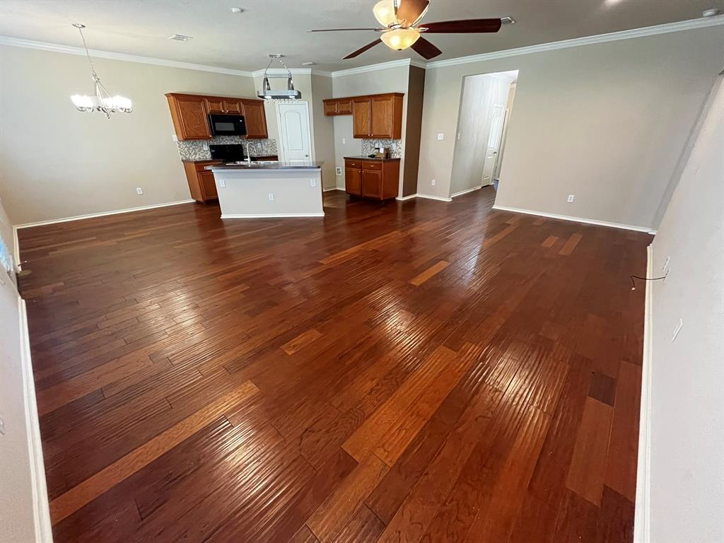 129 Sierra Drive Waxahachie, TX 75167 - Photo 4 of 24 a view of empty room with wooden floor