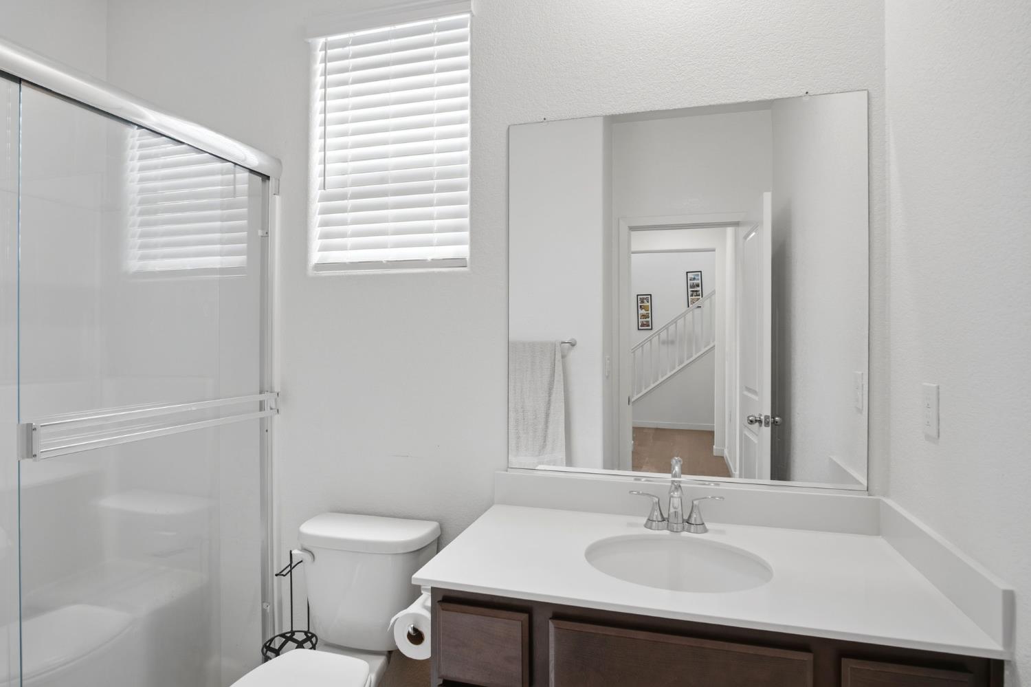 5520 Cora Way Keyes, CA 95328 - Photo 16 of 28 a bathroom with a sink and a toilet