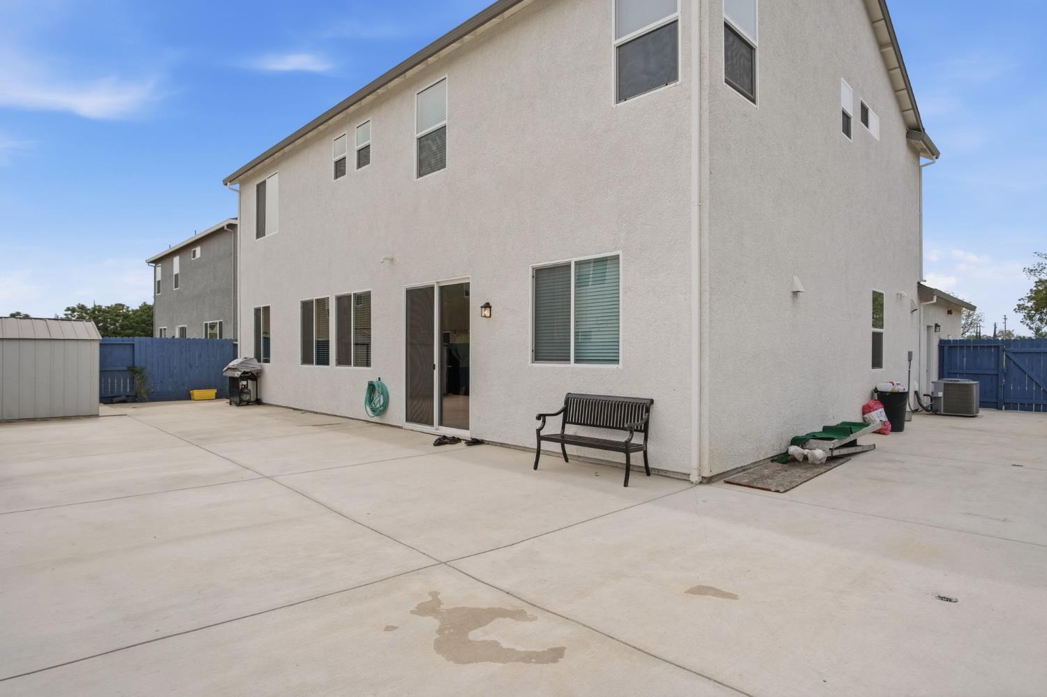 5520 Cora Way Keyes, CA 95328 - Photo 25 of 28 a backyard of a house with table and chairs