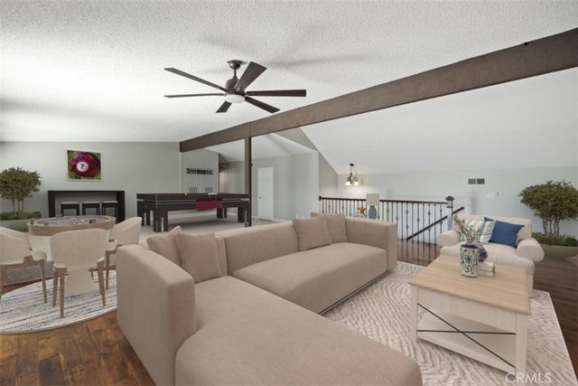 a bedroom with a bed furniture and a window