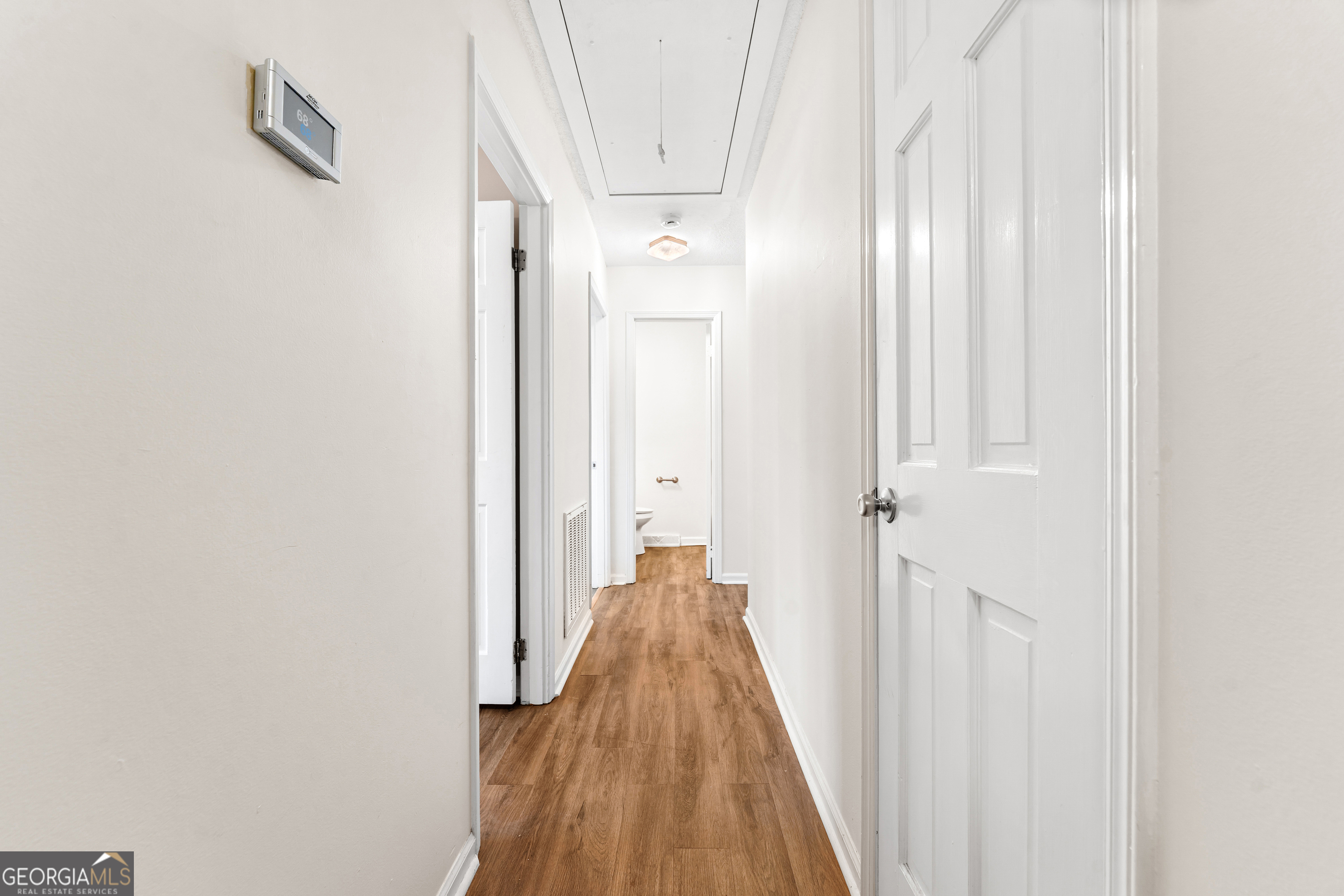 101 Fisher Drive Hartwell, GA 30643 - Photo 30 of 48 a view of a hallway with wooden floor and entryway