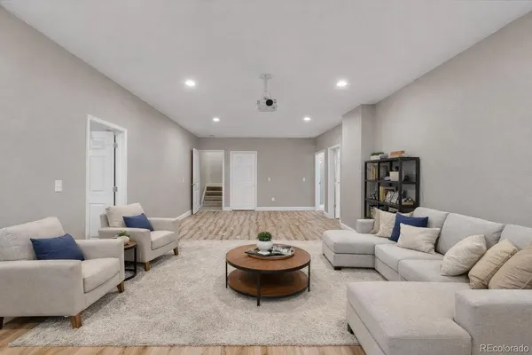 a living room with furniture and a couch