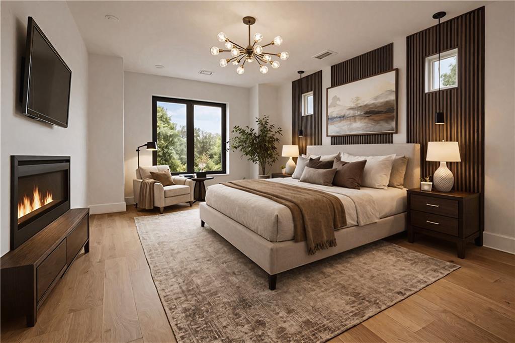 2551 Kilgore Road Buford, GA 30519 - Photo 13 of 45 a bedroom with a bed couch tv and window