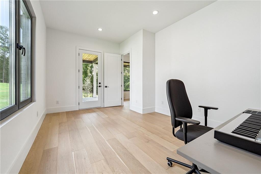 2551 Kilgore Road Buford, GA 30519 - Photo 20 of 45 a view of a workspace with furniture and a window