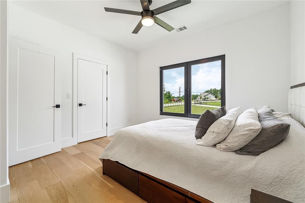 2551 Kilgore Road Buford, GA 30519 - Photo 26 of 45 a bedroom with a bed and window