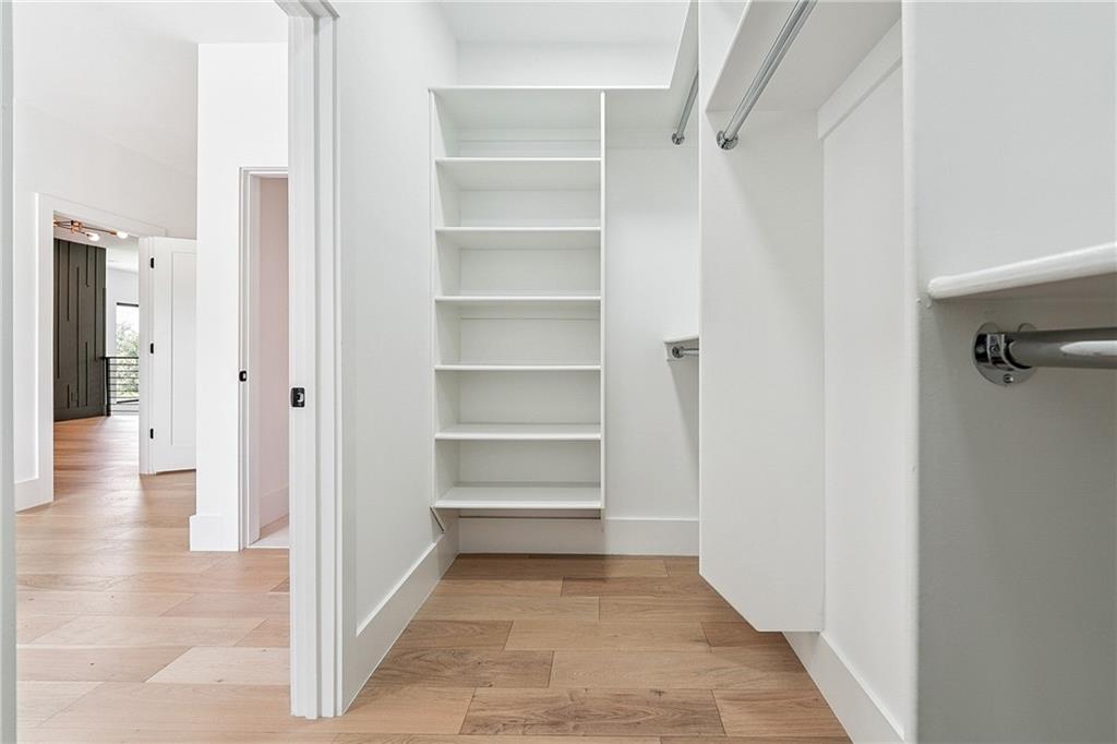2551 Kilgore Road Buford, GA 30519 - Photo 28 of 45 a view of a hallway with wooden floor and closet