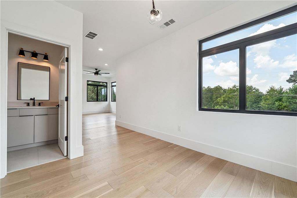 2551 Kilgore Road Buford, GA 30519 - Photo 31 of 45 a view of a kitchen with a sink and a large window
