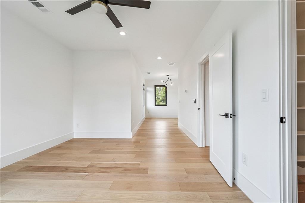 2551 Kilgore Road Buford, GA 30519 - Photo 32 of 45 a view of an empty room with wooden floor