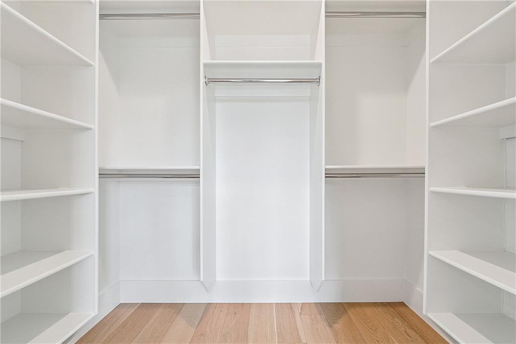 2551 Kilgore Road Buford, GA 30519 - Photo 34 of 45 a view of walk in closet with empty racks