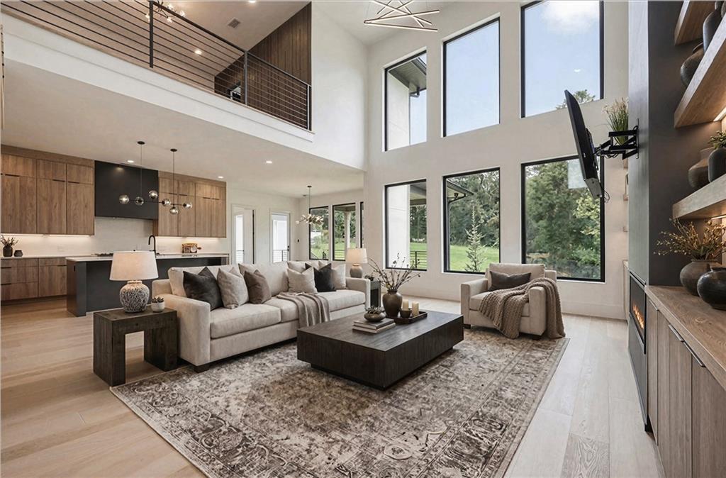 2551 Kilgore Road Buford, GA 30519 - Photo 5 of 45 a living room with furniture fireplace and a large window