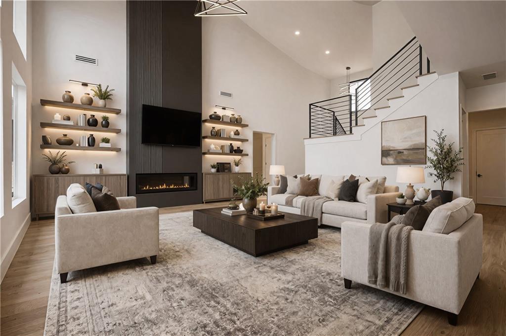 2551 Kilgore Road Buford, GA 30519 - Photo 6 of 45 a living room with fireplace furniture and a flat screen tv