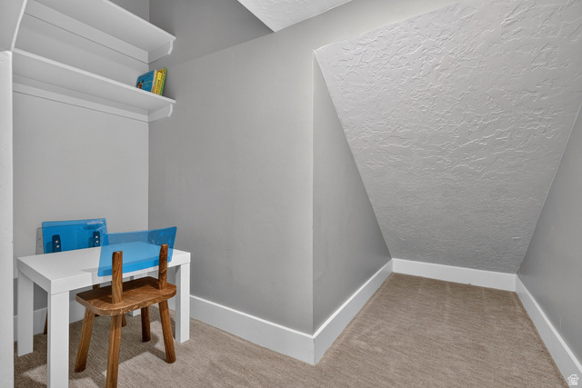 1263 East 1200th South Springville, UT 84663 - Photo 39 of 60 Alcove with built-in shelving, neutral wall paint, white baseboards, and textured ceiling