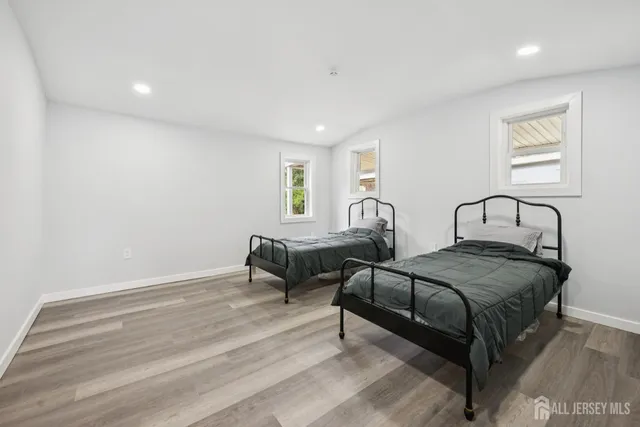 a view of a livingroom with wooden floor