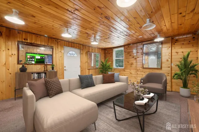 a view of a house with a fence and a porch
