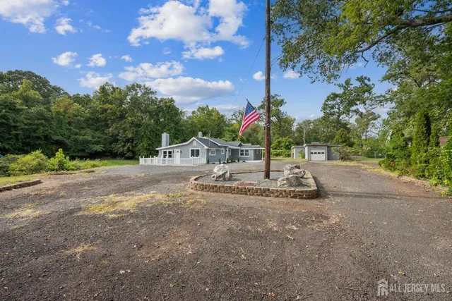 an aerial view of residential house with outdoor space