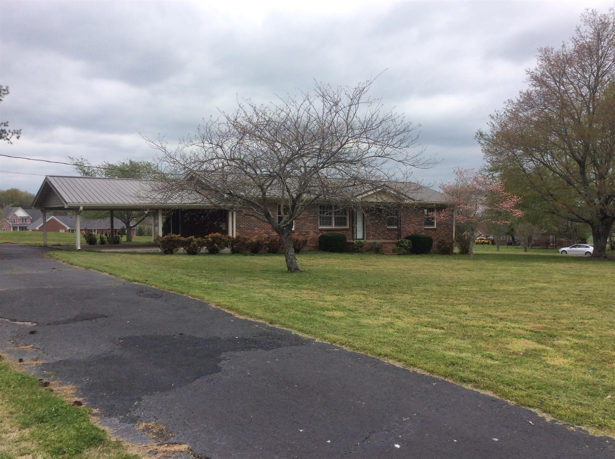 808 Cheatham Springs Road Eagleville, TN 37060 - Photo 3 of 24 Large level lot with paved, circle drive.